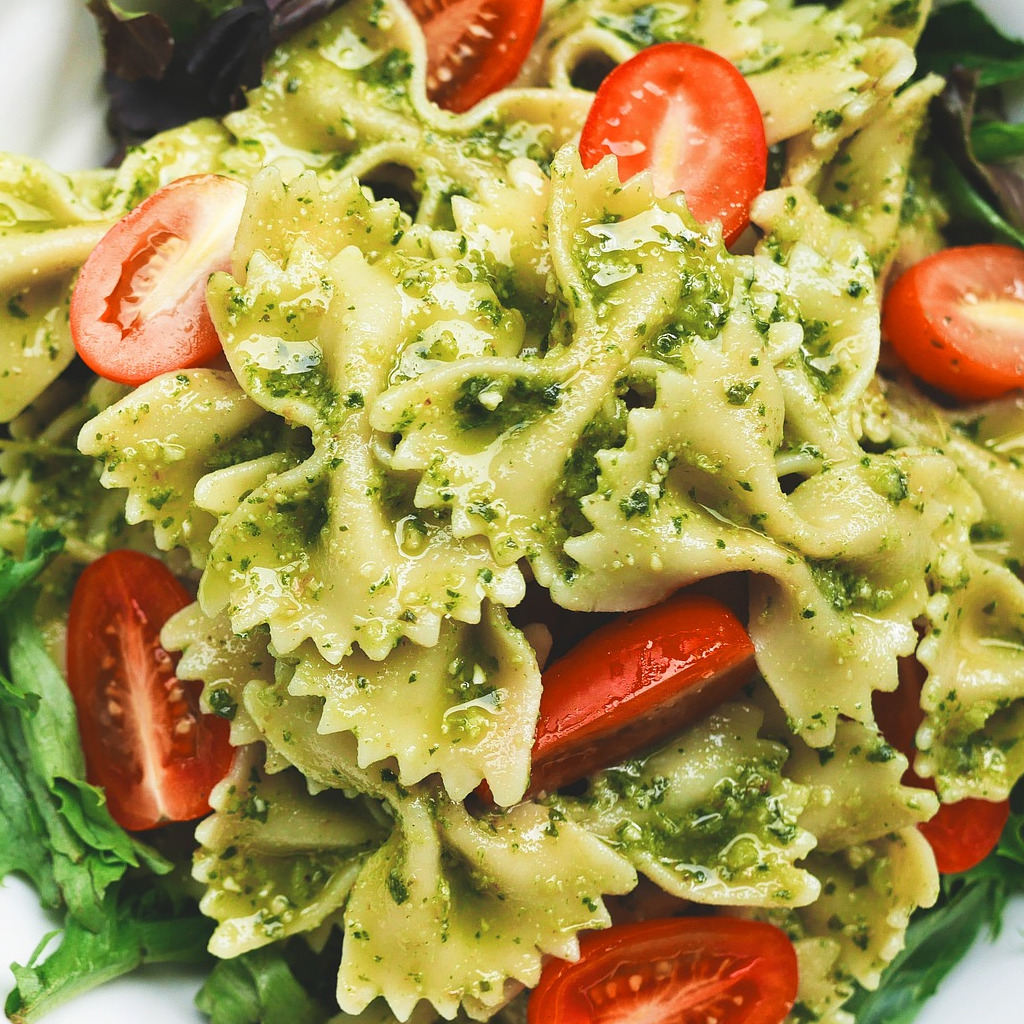 Pasta with pesto sauce and tomatoes