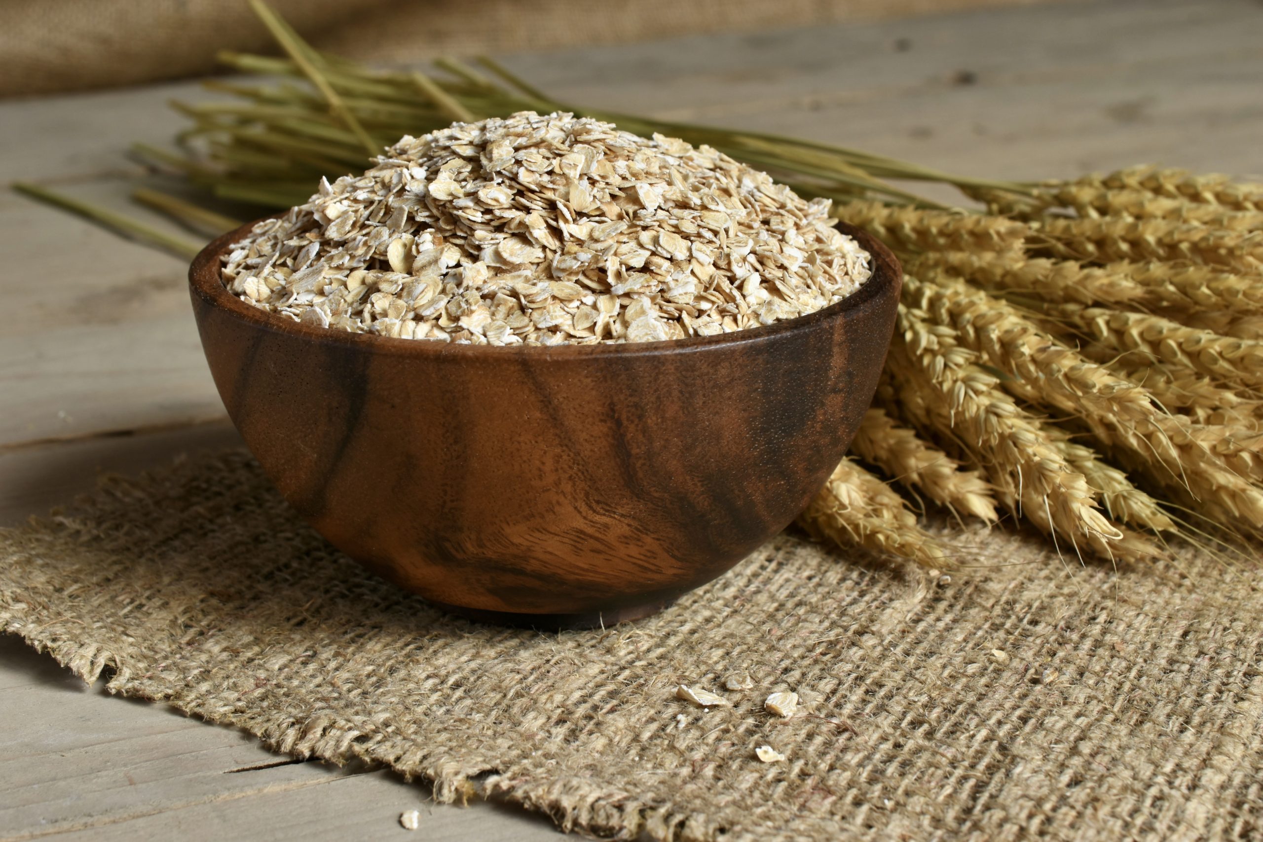 rolled oats in a wooden bowl breakfast